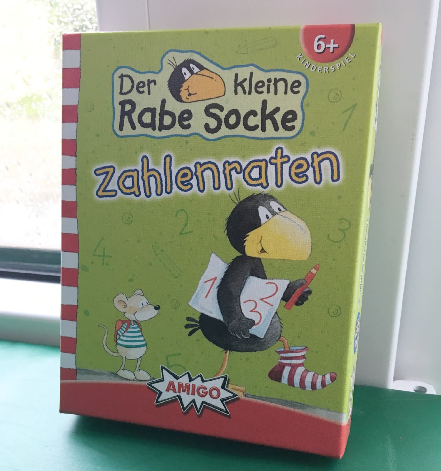 Amigo Spiel fuer Vorschulkinder "Der kleine Rabe Socke Zahlenraten"